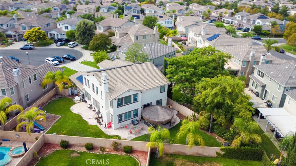 an aerial view of a house with a garden