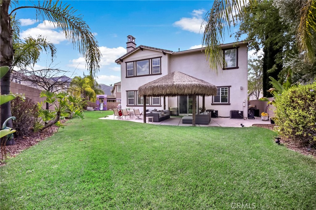 32001 Whitetail Lane Temecula, CA 92592 - Photo 25 of 28 a view of a house with a yard and sitting area