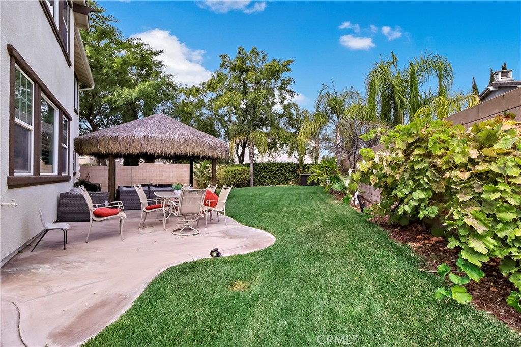 32001 Whitetail Lane Temecula, CA 92592 - Photo 28 of 28 a view of a backyard with sitting area and furniture