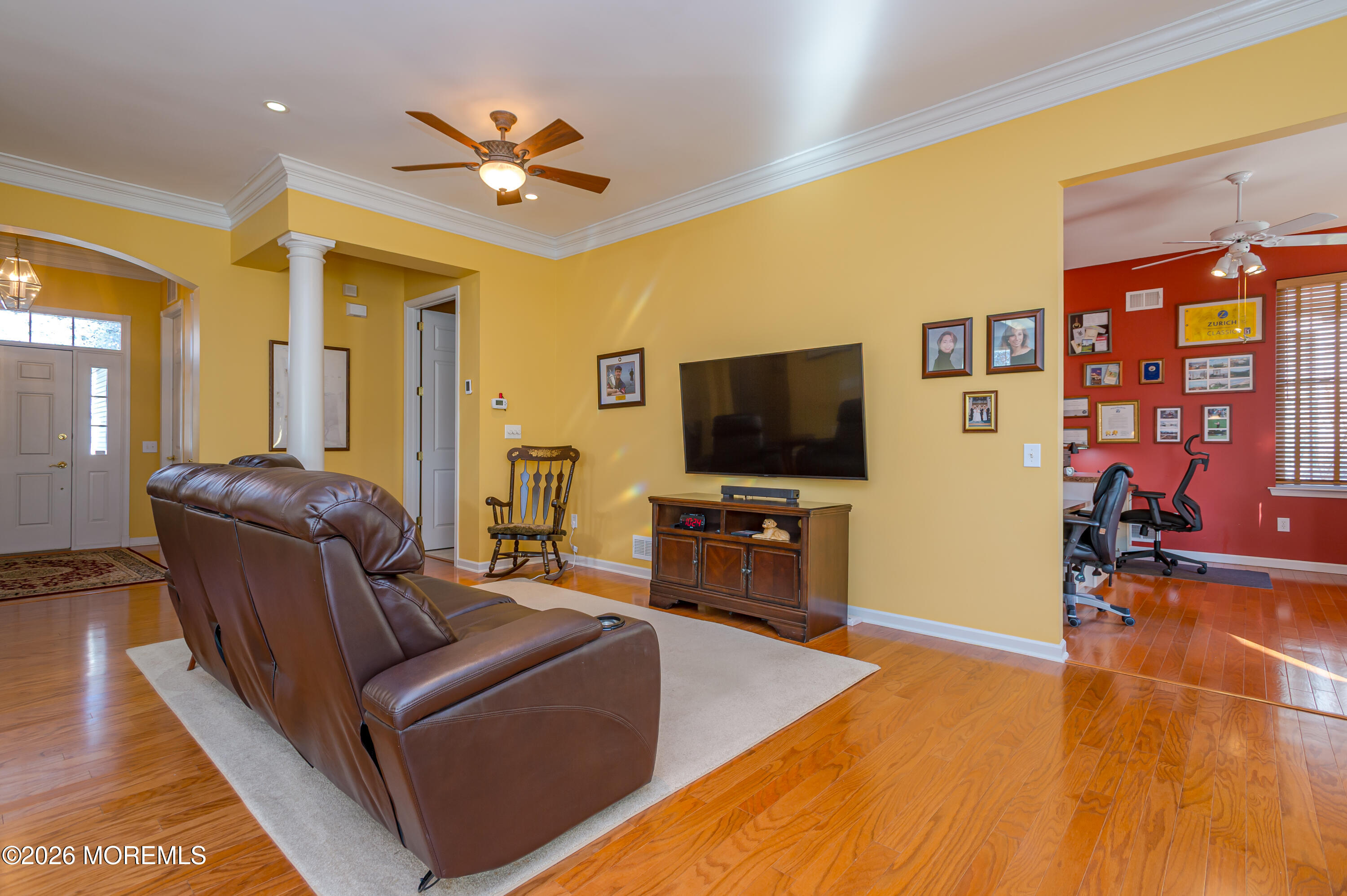 21 Sawgrass Street Jackson, NJ 08527 - Photo 11 of 23 a living room with furniture and a flat screen tv