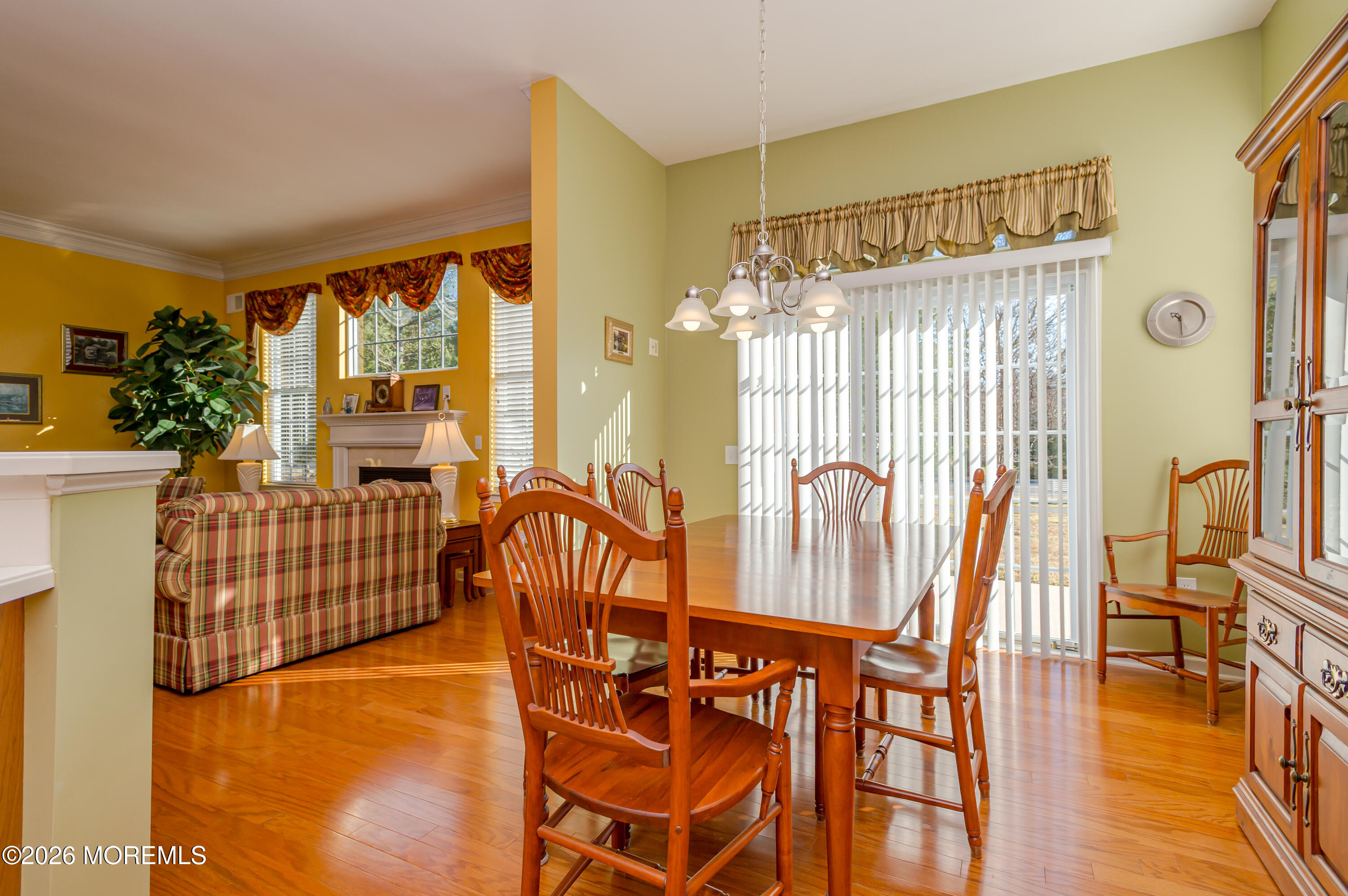 21 Sawgrass Street Jackson, NJ 08527 - Photo 15 of 23 a view of a balcony with furniture and wooden floor