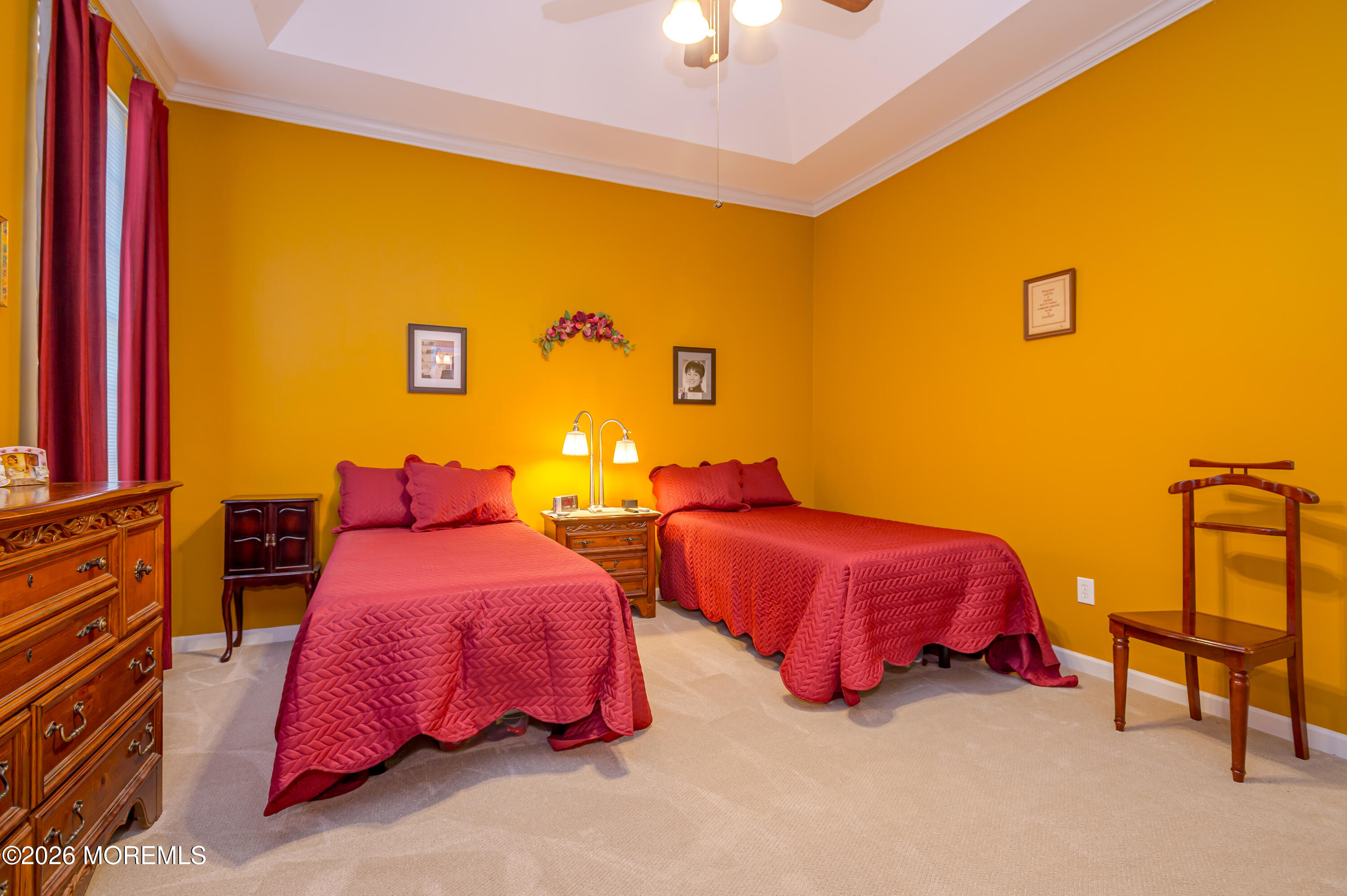 21 Sawgrass Street Jackson, NJ 08527 - Photo 20 of 23 a bedroom with bed and a chandelier