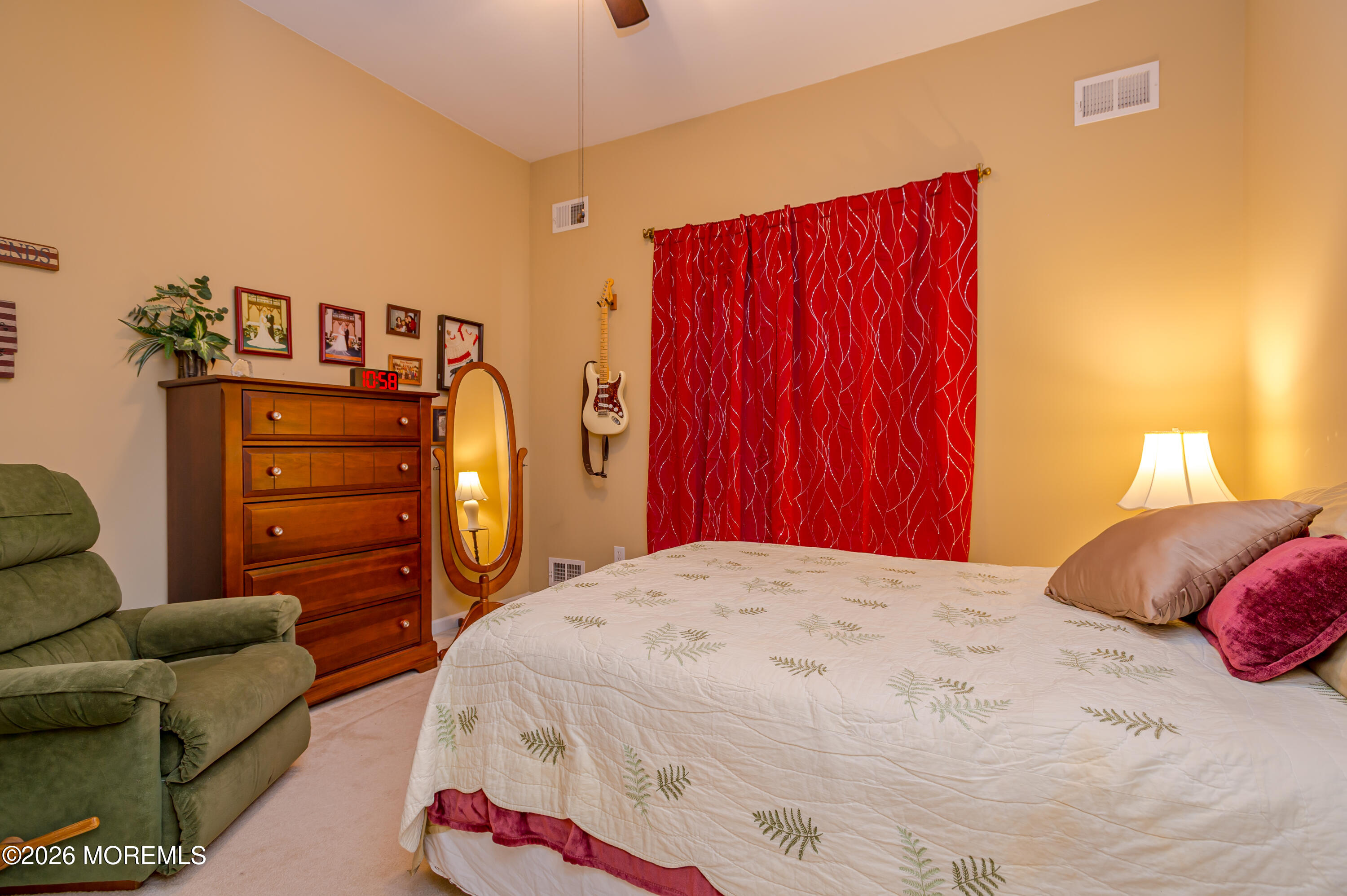 21 Sawgrass Street Jackson, NJ 08527 - Photo 8 of 23 a bedroom with a bed and a closet