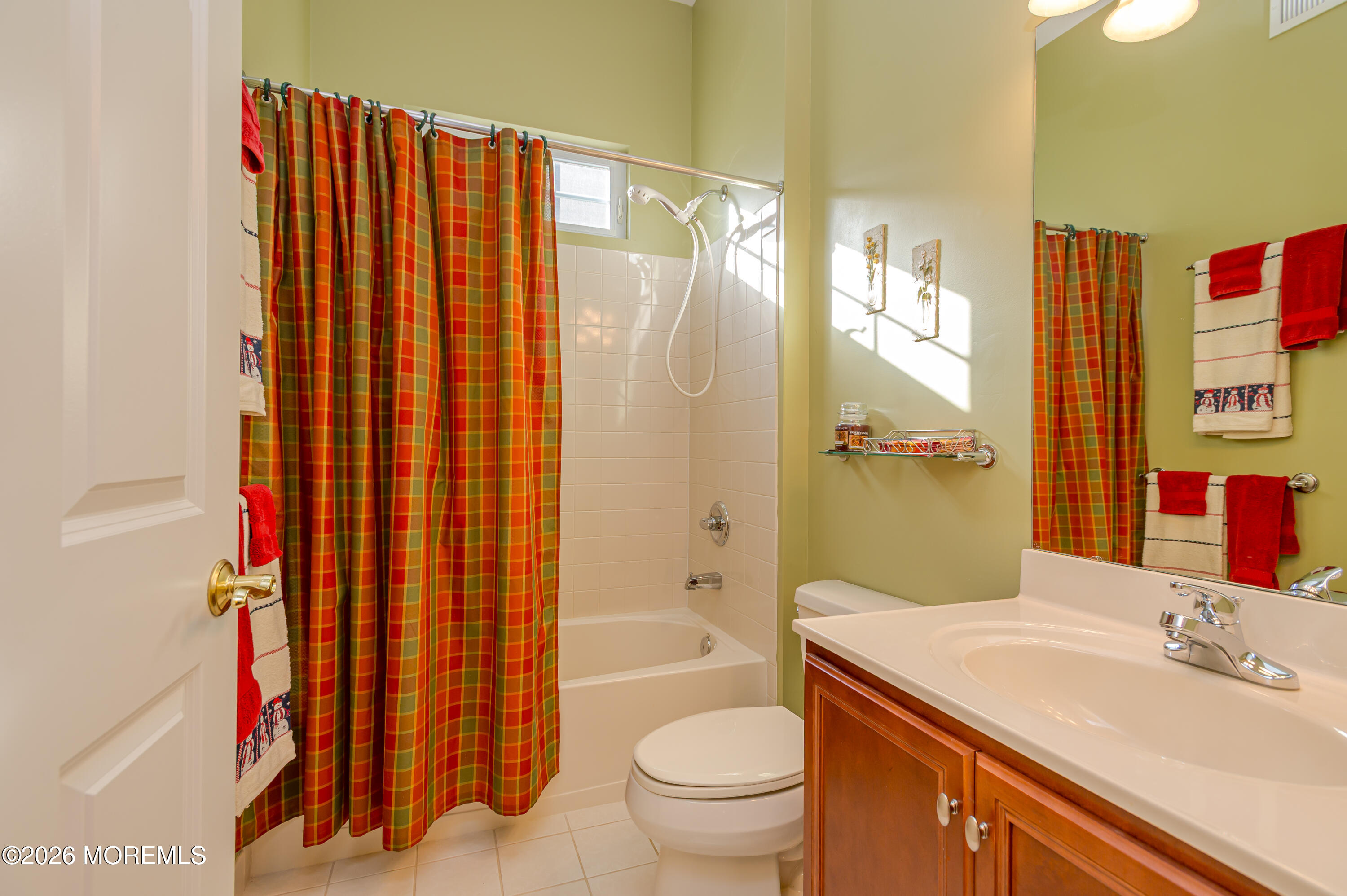 21 Sawgrass Street Jackson, NJ 08527 - Photo 9 of 23 a bathroom with a sink toilet and shower