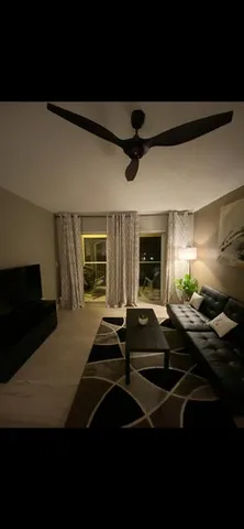 a front view of a house with parking space