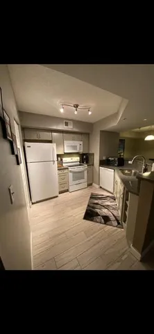 a view of kitchen with stainless steel appliances