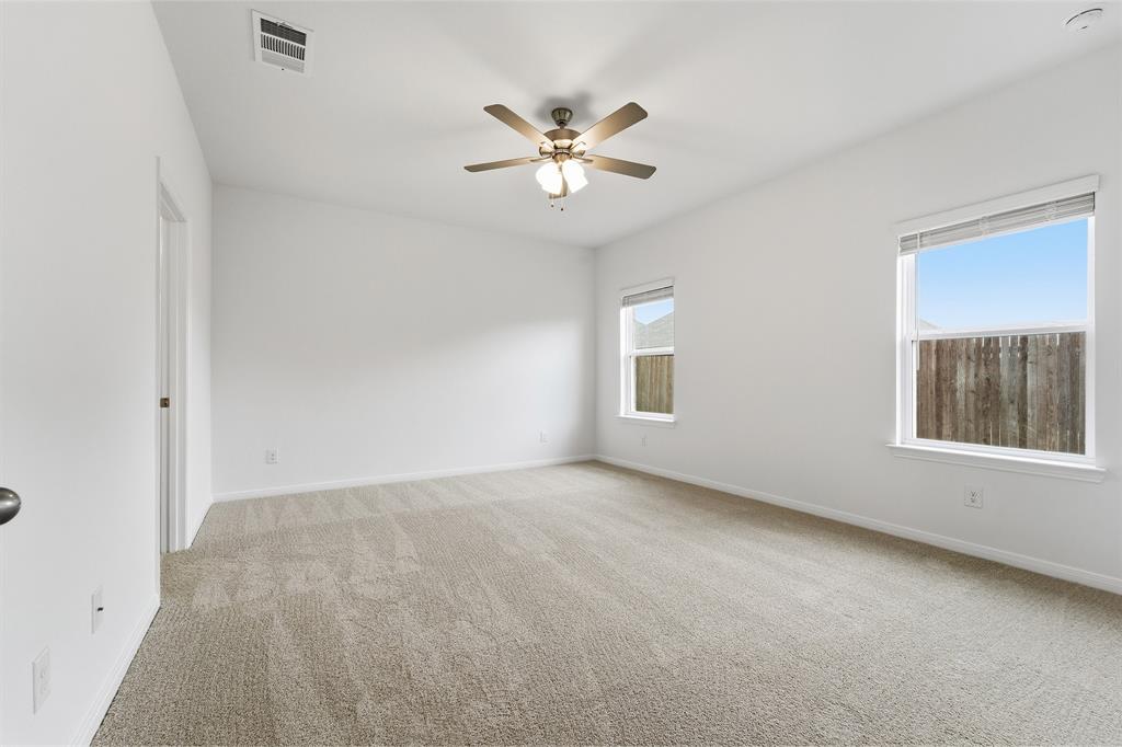 232 Triple Crown Road Waxahachie, TX 75165 - Photo 15 of 22 a view of an empty room with a window