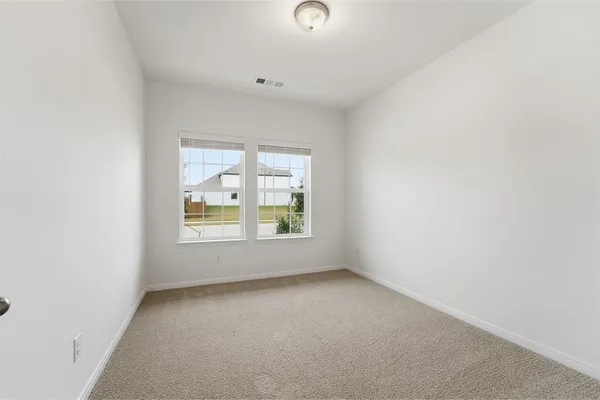 an empty room with a window