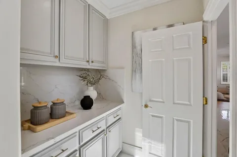 a view of a field with an trees