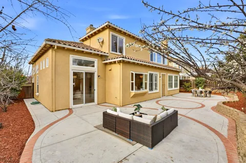 a view of a park with swings and slides