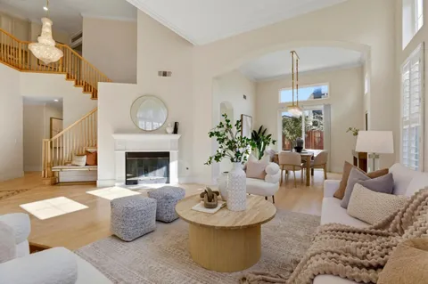 a living room with furniture and window