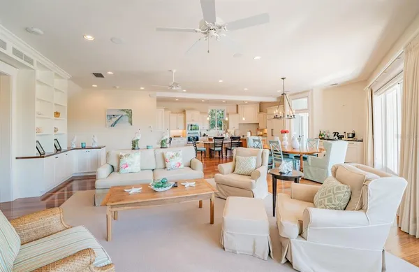 a spacious bedroom with a large bed and a large window