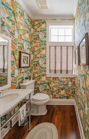 a living room with furniture a flat screen tv and a large window