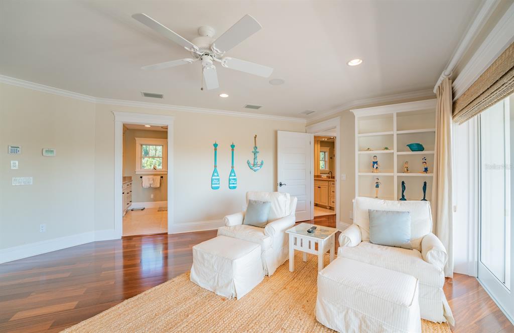 714 Jacaranda Road Anna Maria, FL 34216 - Photo 34 of 100 a living room with furniture and a wooden floor