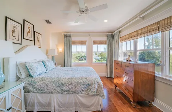 a house view with swimming pool and sitting space