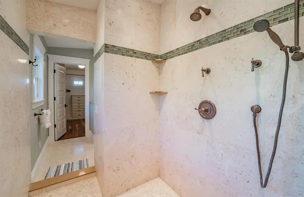 an aerial view of a city with ocean view