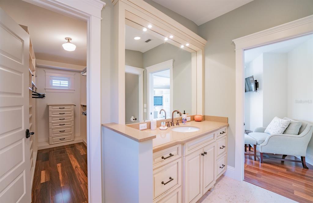 714 Jacaranda Road Anna Maria, FL 34216 - Photo 50 of 100 a spacious bathroom with a double vanity sink a mirror and a shower
