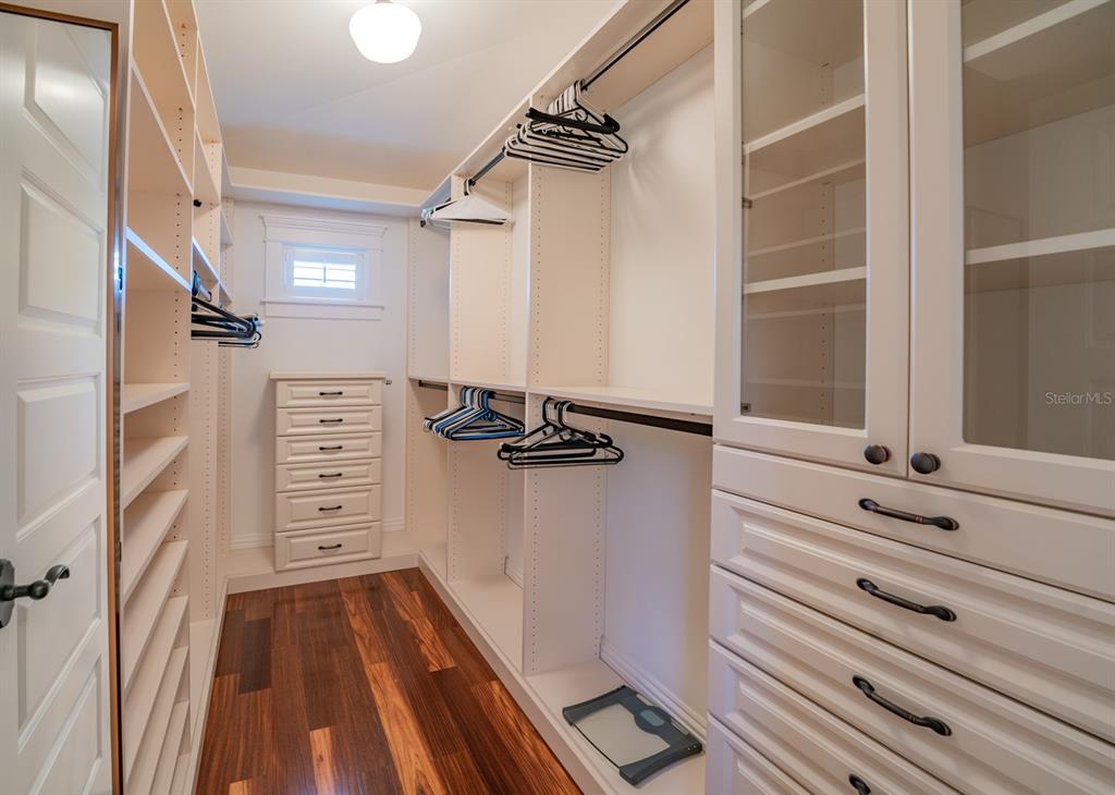 714 Jacaranda Road Anna Maria, FL 34216 - Photo 52 of 100 a view of walk in closet with clothes and shoes