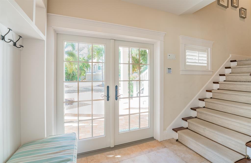 714 Jacaranda Road Anna Maria, FL 34216 - Photo 59 of 100 a view of entryway and hall with wooden floor