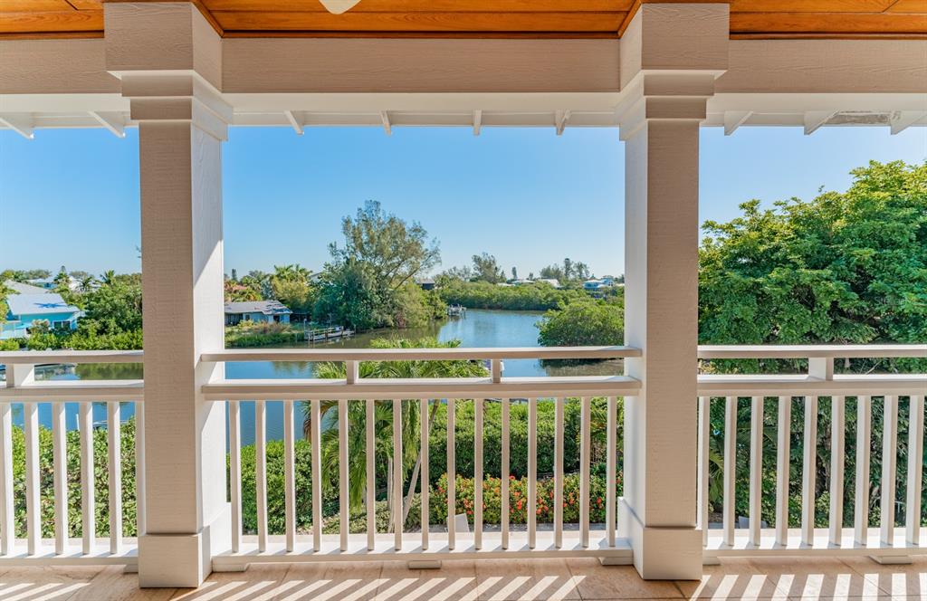 714 Jacaranda Road Anna Maria, FL 34216 - Photo 76 of 100 a view of a balcony with an outdoor space