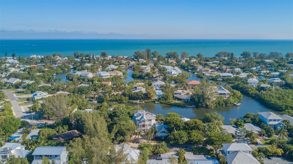 714 Jacaranda Road Anna Maria, FL 34216 - Photo 96 of 100 an aerial view of a city with ocean view