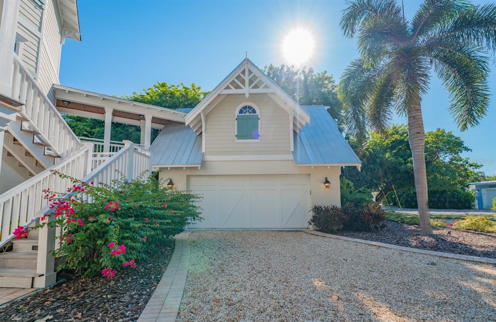 714 Jacaranda Road Anna Maria, FL 34216 - Photo 10 of 100 a house view with a garden space