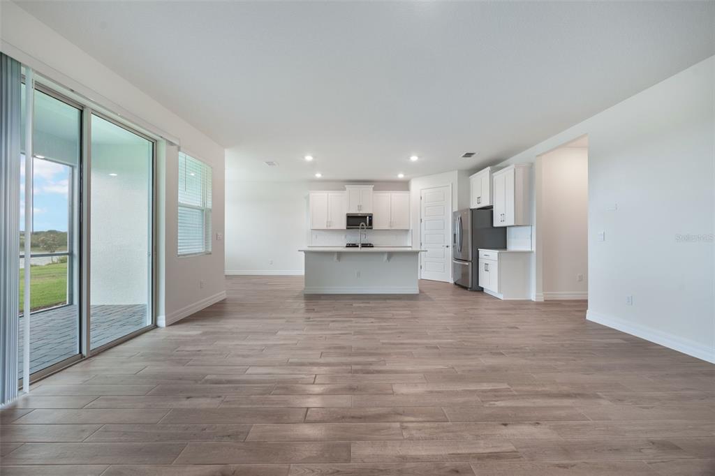 2277 Hamden Way Mount Dora, FL 32757 - Photo 19 of 32 a view of kitchen with wooden floor