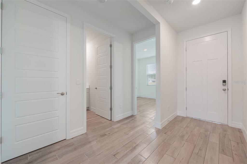 2277 Hamden Way Mount Dora, FL 32757 - Photo 5 of 32 wooden floor in an empty room