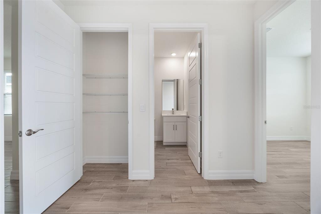 2277 Hamden Way Mount Dora, FL 32757 - Photo 6 of 32 a view of a bathroom from a hallway
