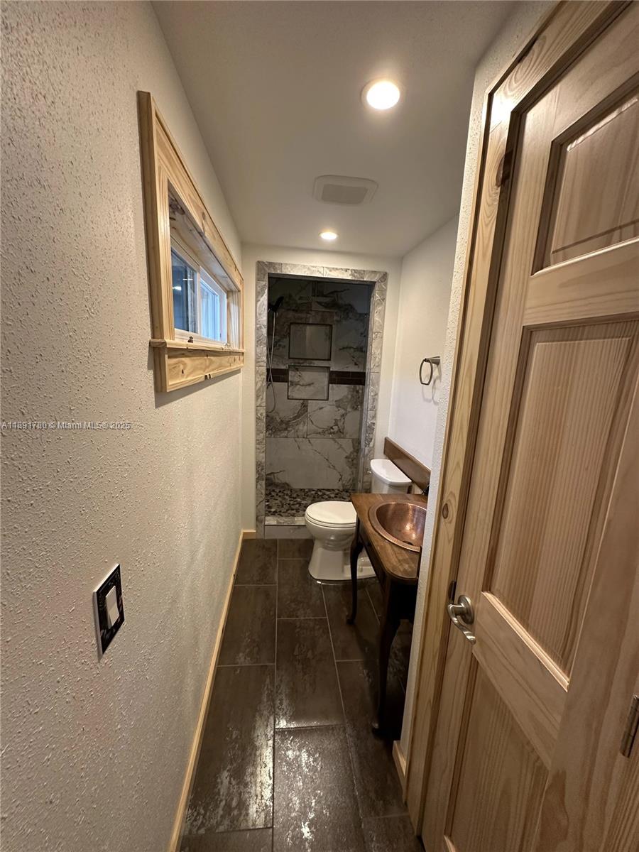 111 Springdale Road Sebring, FL 33870 - Photo 22 of 50 a bathroom with a sink and toilet