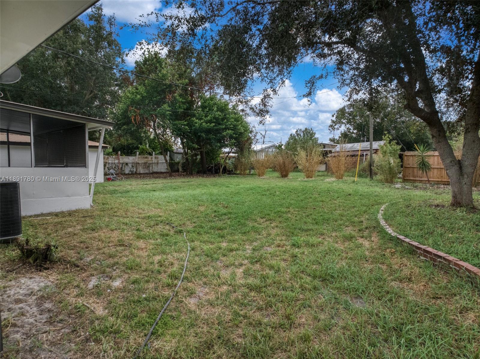 111 Springdale Road Sebring, FL 33870 - Photo 39 of 50 a view of a backyard
