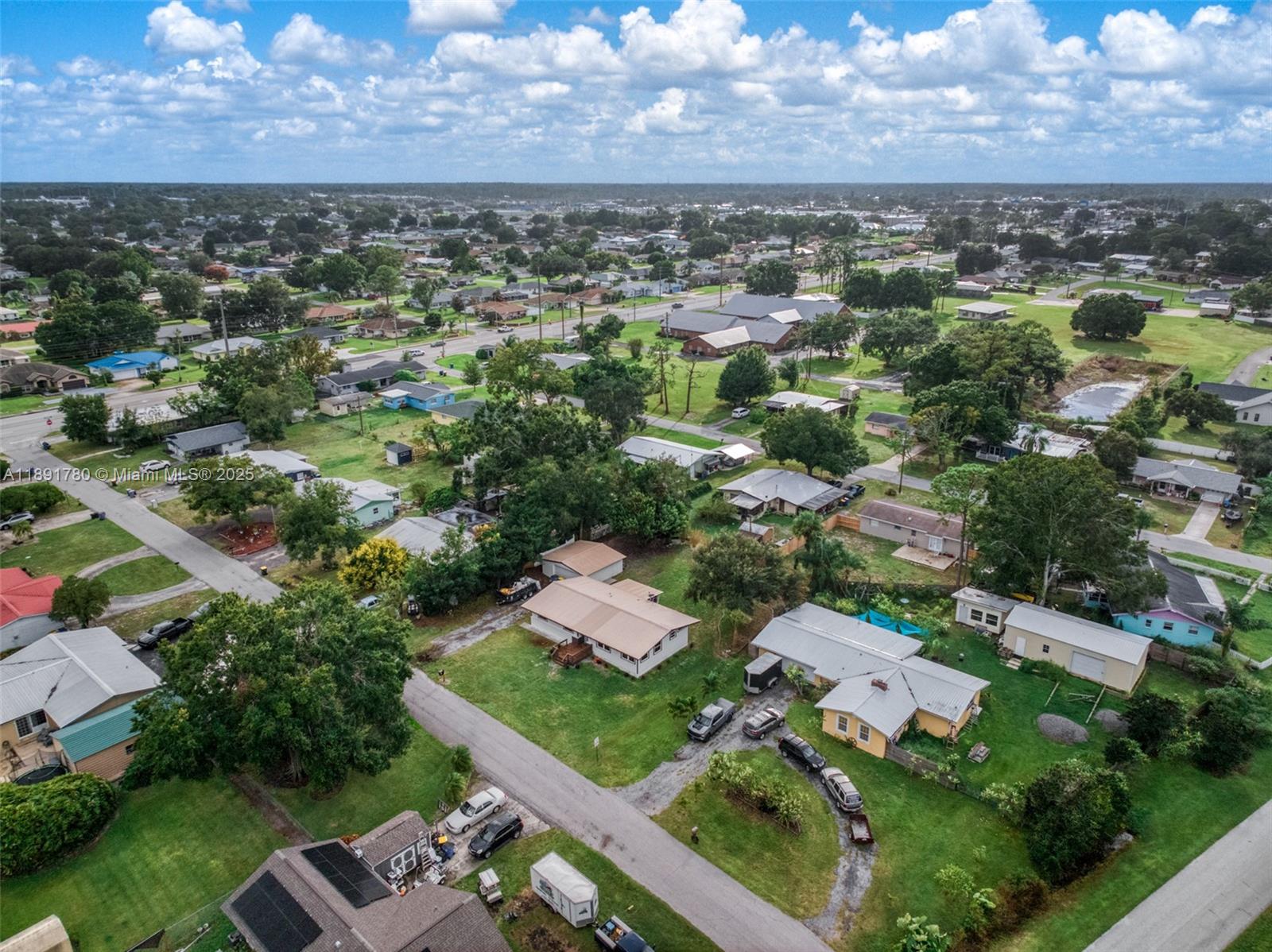 111 Springdale Road Sebring, FL 33870 - Photo 41 of 50 an aerial view of residential houses with outdoor space and trees