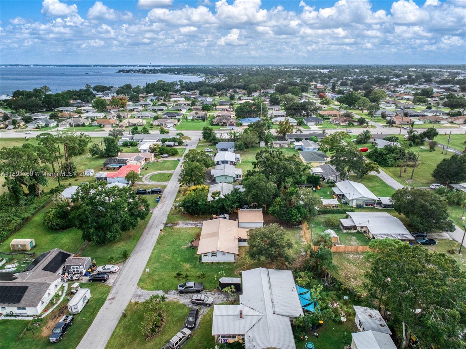 111 Springdale Road Sebring, FL 33870 - Photo 42 of 50 an aerial view of residential houses with outdoor space and trees