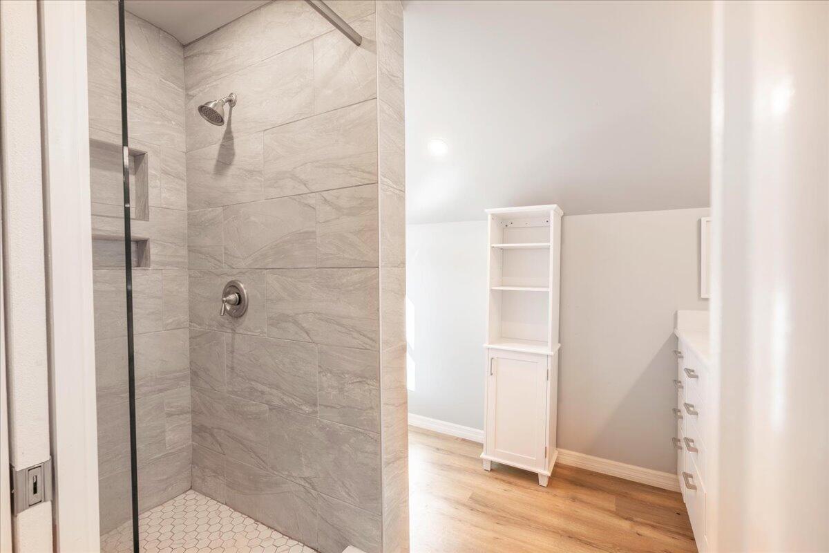 3167 Stewart Road Summerland Key, FL 33042 - Photo 23 of 33 a bathroom with a glass shower door