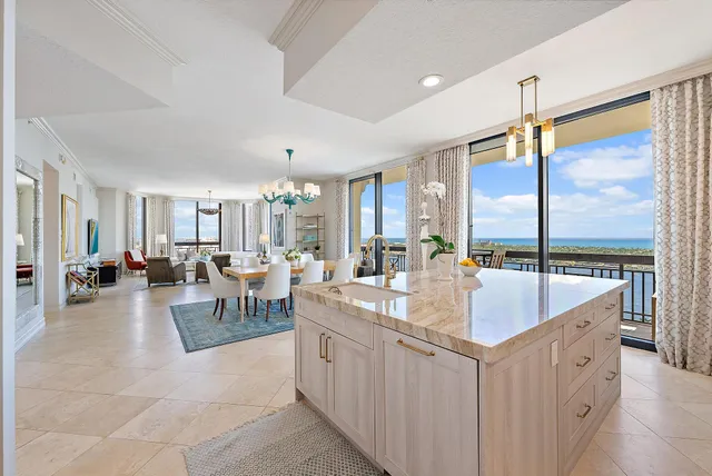 a view of a terrace with wooden floor and seating space