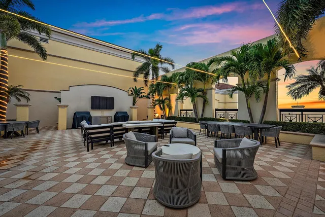 a living room with furniture and a view of balcony