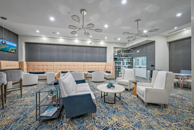 an aerial view of residential houses with city view