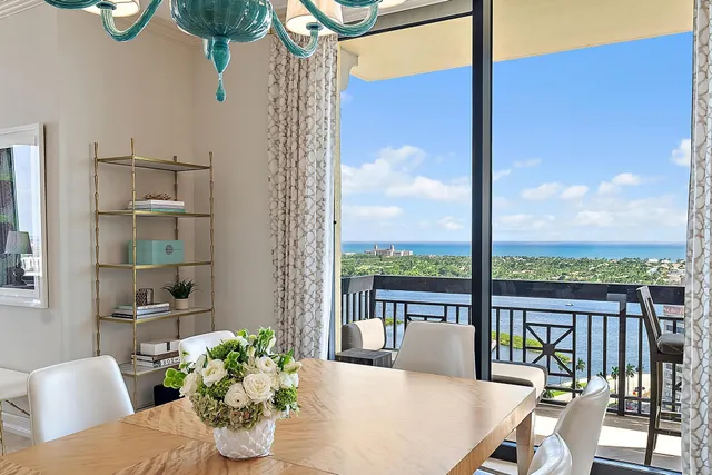 a view of a dining room with furniture window and outside view