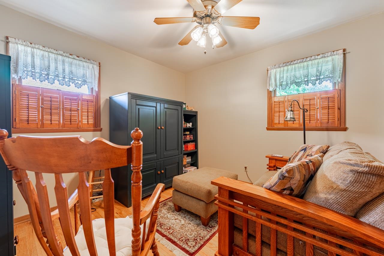 438 Rebecca Road Belvidere, IL 61008 - Photo 15 of 28 a bedroom with furniture and a window