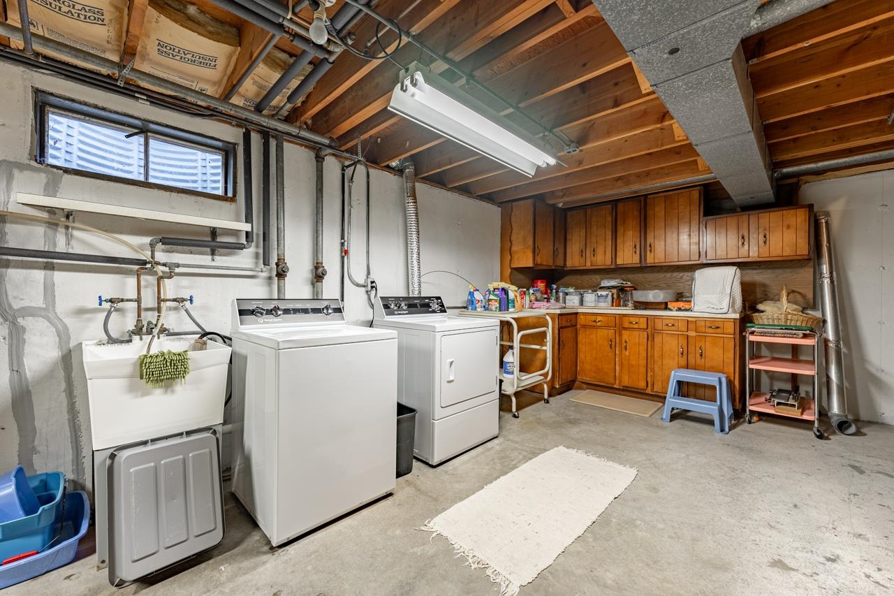 438 Rebecca Road Belvidere, IL 61008 - Photo 20 of 28 a view of a storage & utility room with washer and dryer