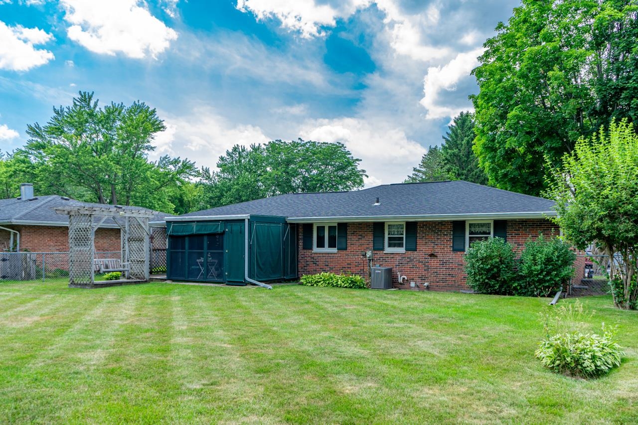 438 Rebecca Road Belvidere, IL 61008 - Photo 27 of 28 a front view of house with yard and green space