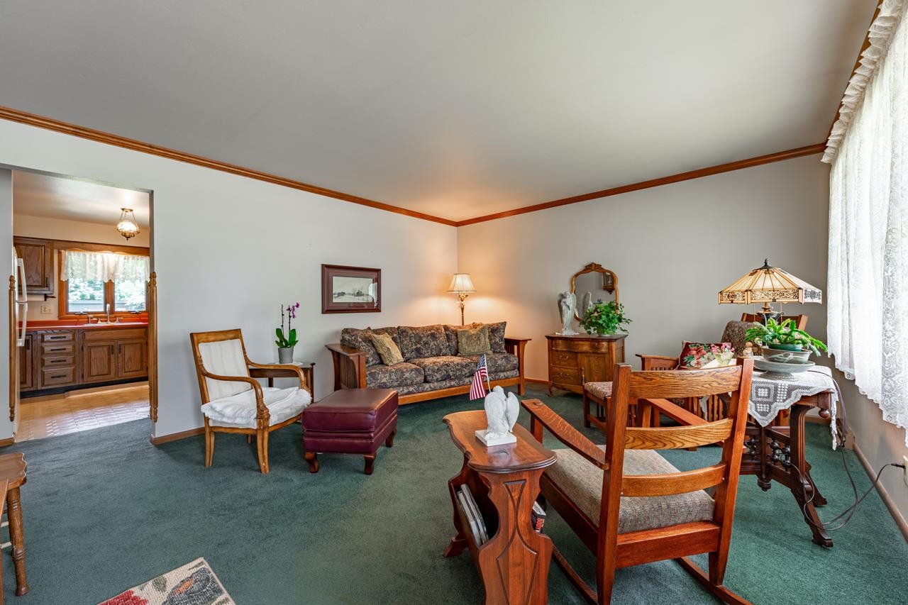 438 Rebecca Road Belvidere, IL 61008 - Photo 6 of 28 a living room with furniture and wooden floor