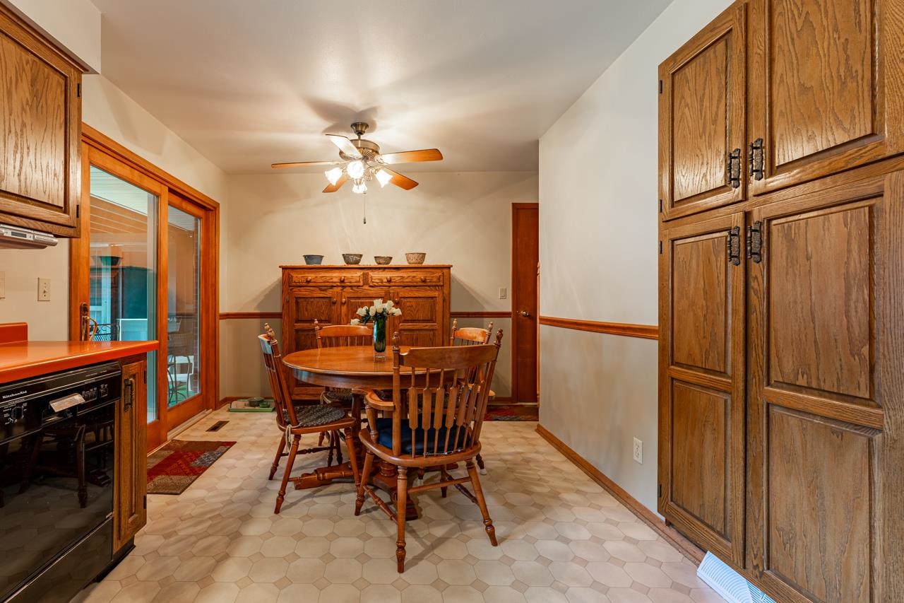 438 Rebecca Road Belvidere, IL 61008 - Photo 10 of 28 a view of a dining room with furniture window and wooden floor