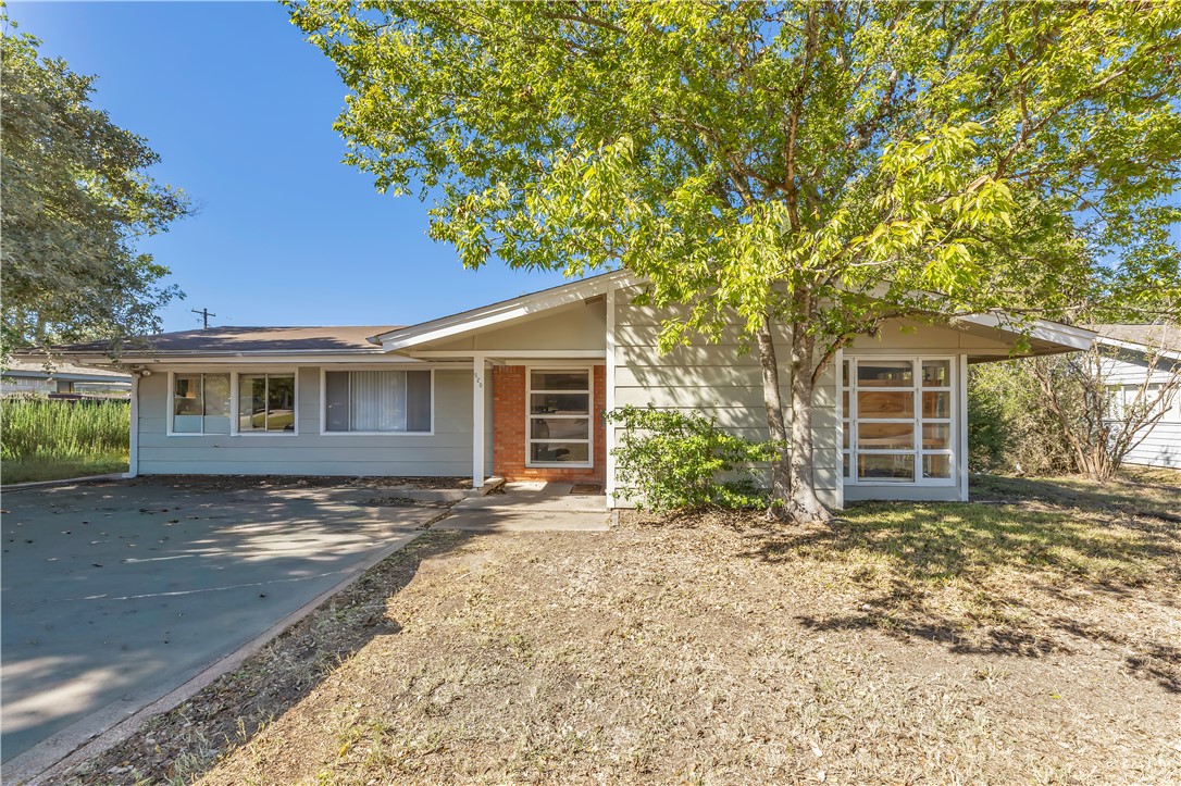 520 Helena Street Bryan, TX 77801 - Photo 1 of 1 a view of a house with a yard