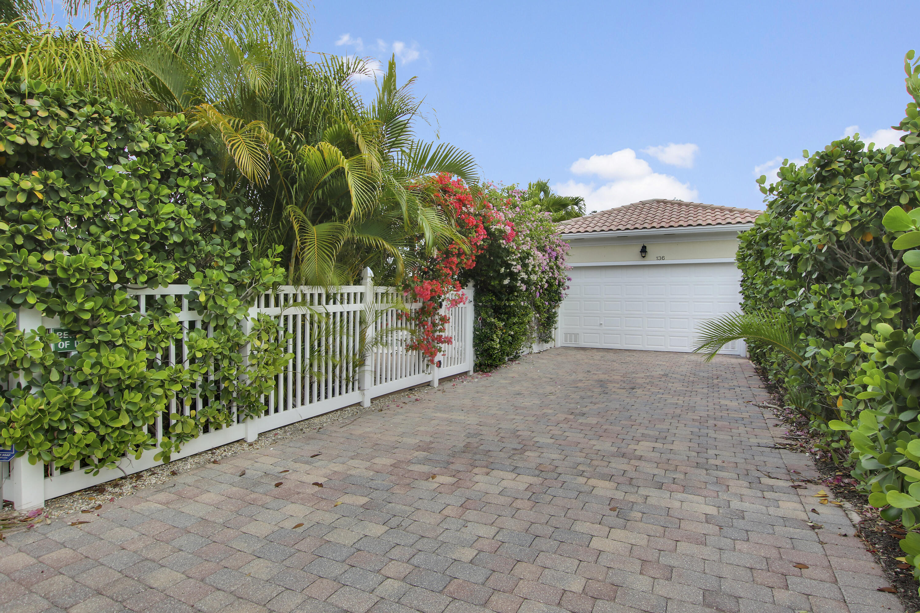 136 Florence Drive Jupiter, FL 33458 - Photo 46 of 51 Back of House with Garage