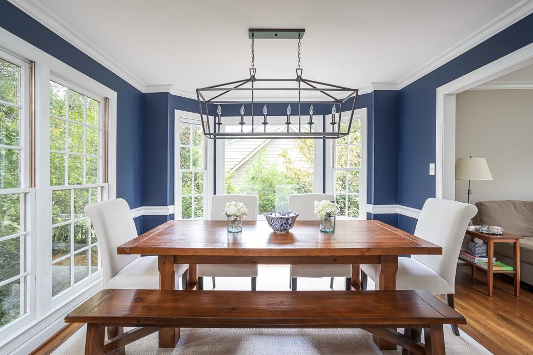 8716 Mariner Drive Raleigh, NC 27615 - Photo 14 of 26 Natural light abounds from the dual aspect windows in this inviting dining room.
