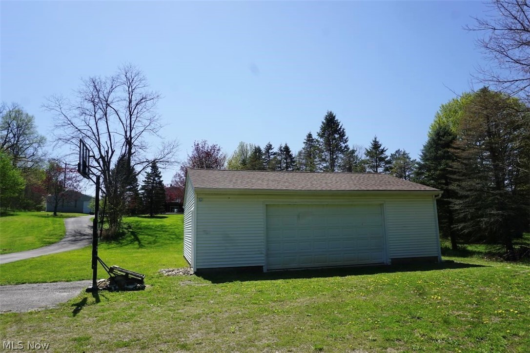 4173 South Ridge Road East Geneva, OH 44041 - Photo 35 of 42 Rear garage & storage