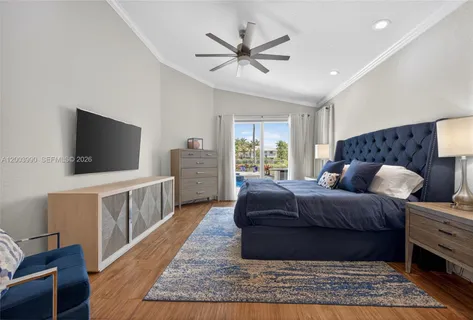 a living room with a couch and a flat screen tv