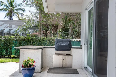 a view of a house with a yard porch and sitting area