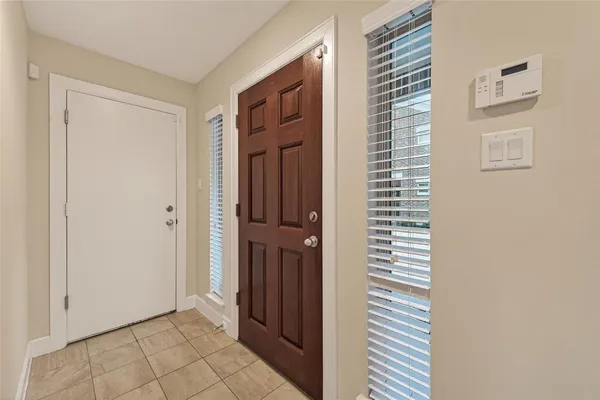 a view of a hallway with closet area